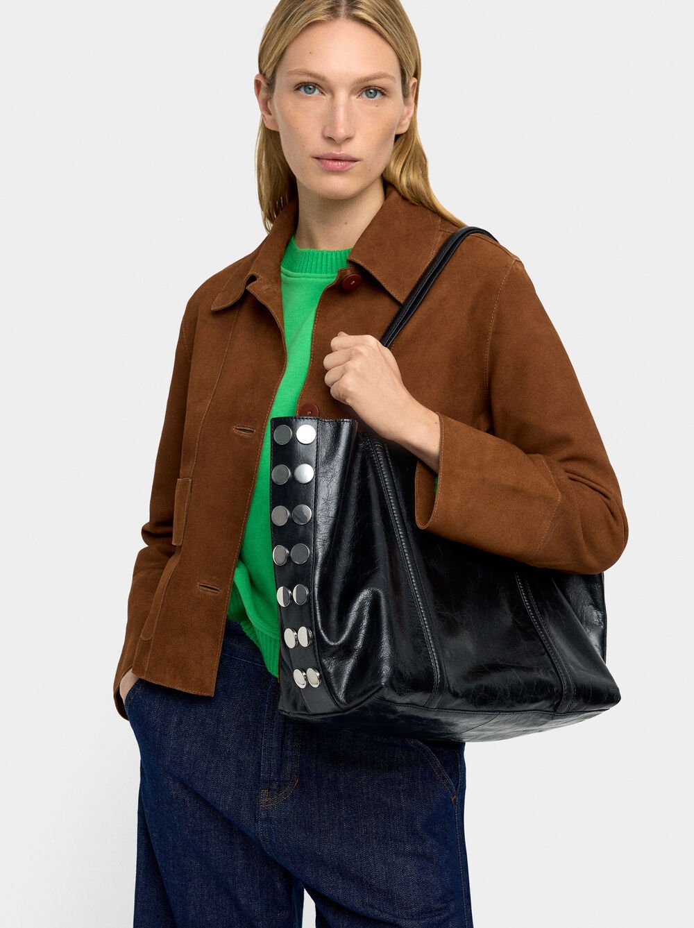 Mala shopper de pele com tachas