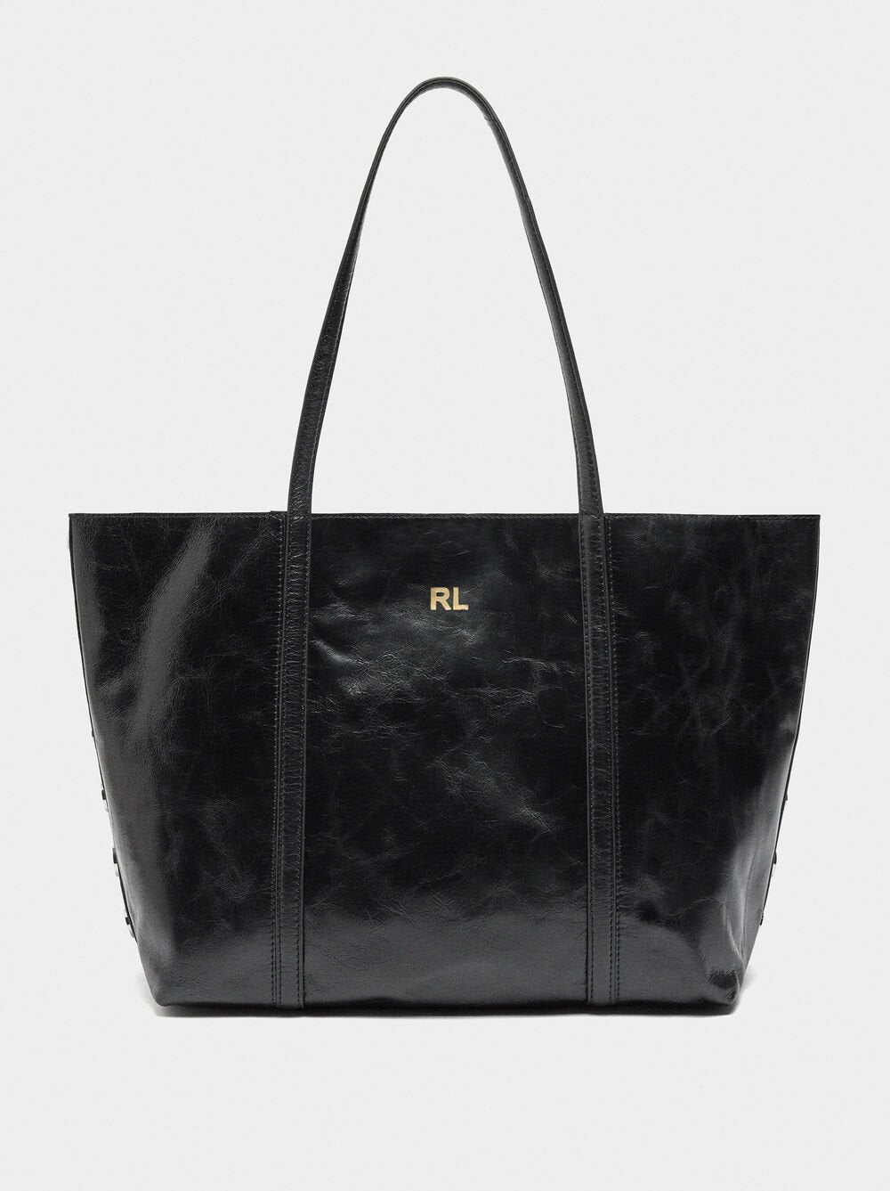 Mala shopper de pele com tachas