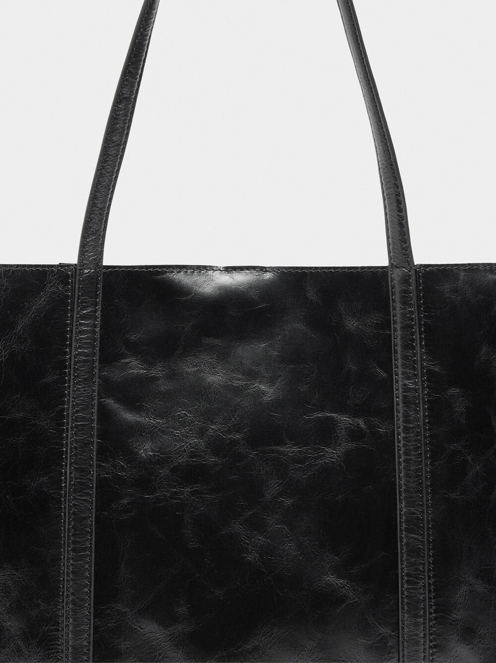 Mala shopper de pele com tachas