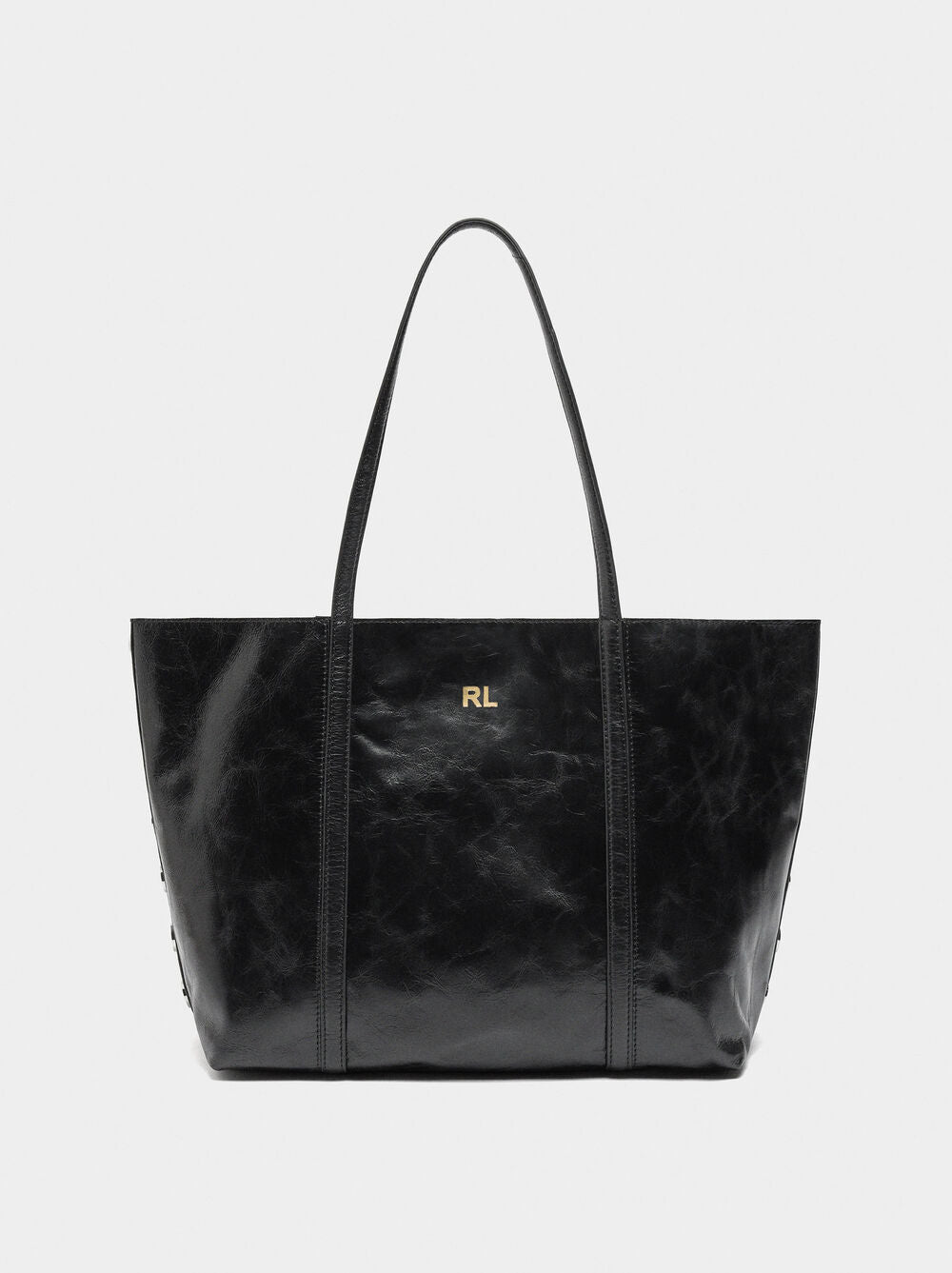 Mala shopper de pele com tachas