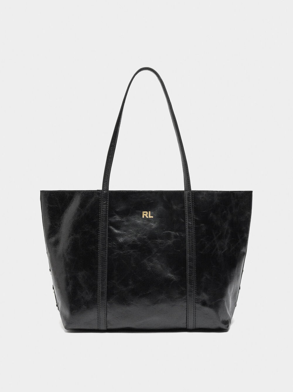 Mala shopper de pele com tachas