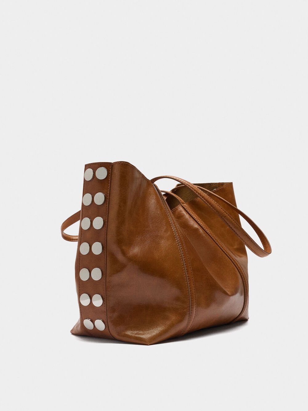 Mala shopper de pele com tachas