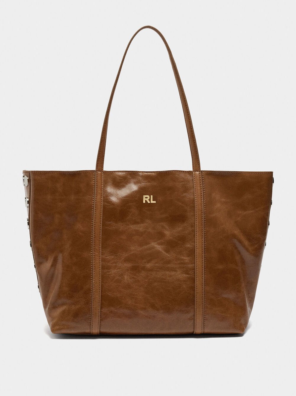 Mala shopper de pele com tachas