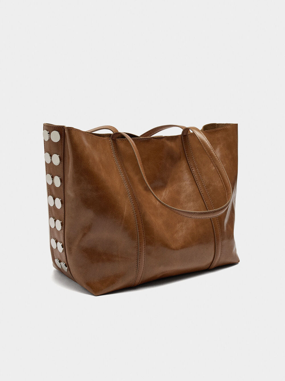 Mala shopper de pele com tachas