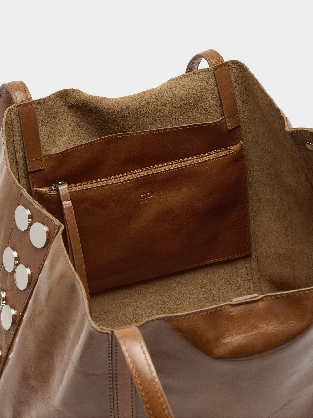 Mala shopper de pele com tachas