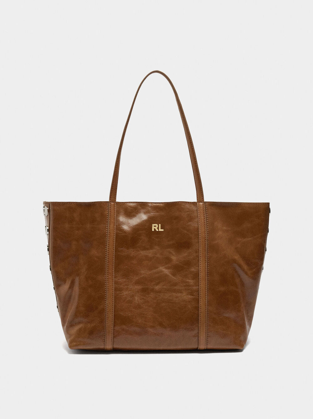 Mala shopper de pele com tachas
