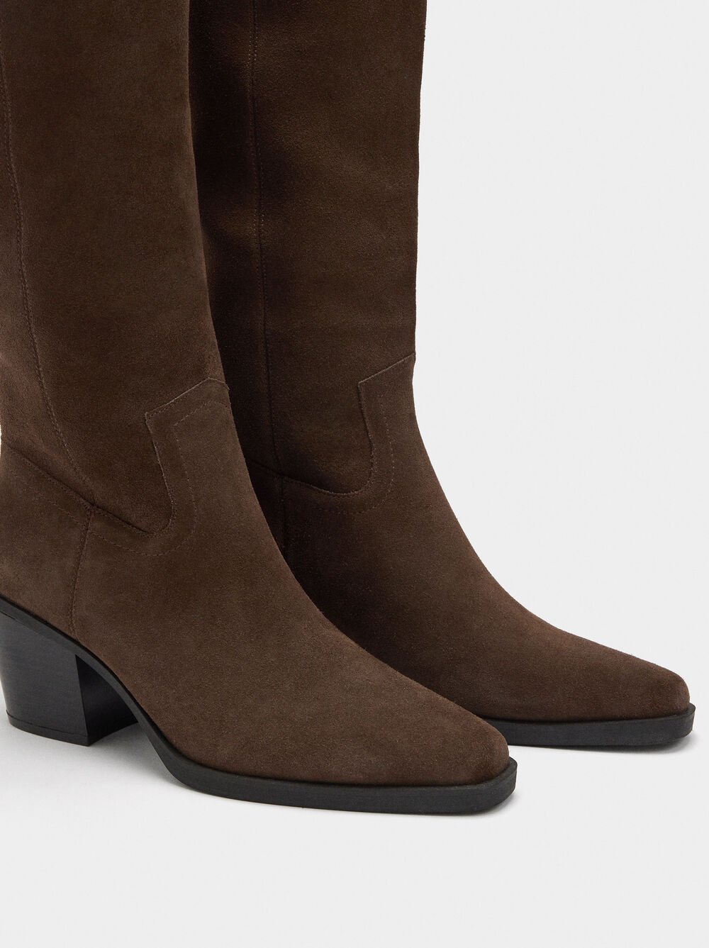 Botas de pele com cano alto