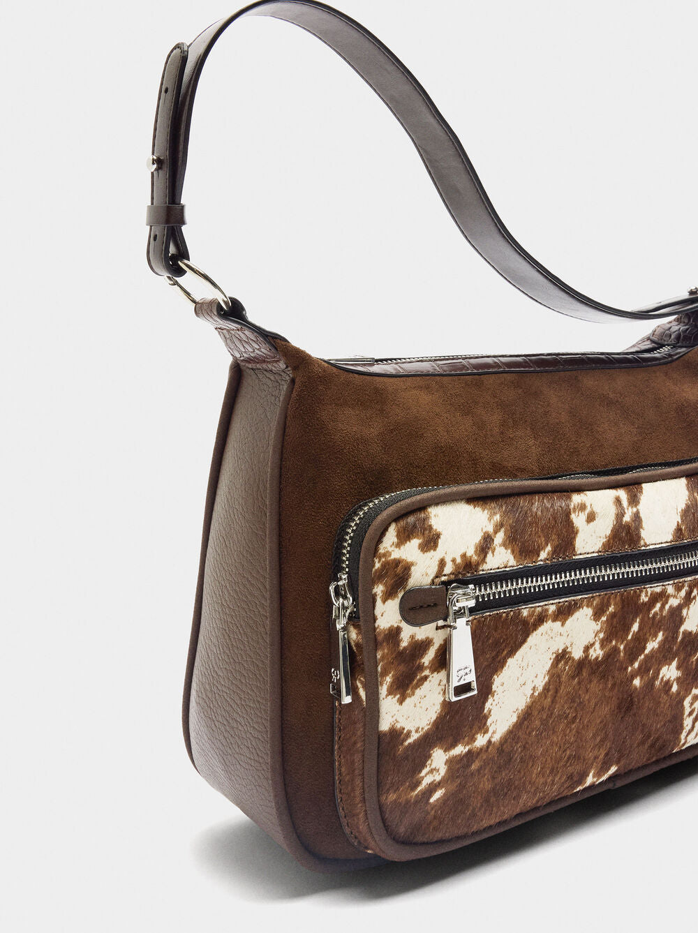 Mala tiracolo com pele