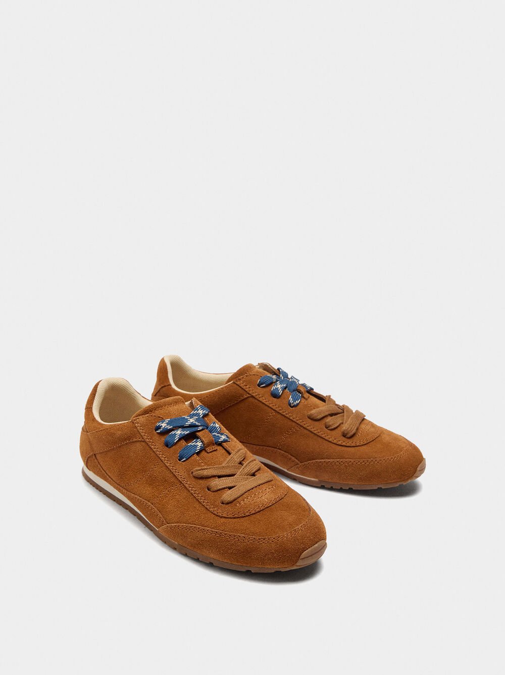 Sapatilhas de pele monocromática