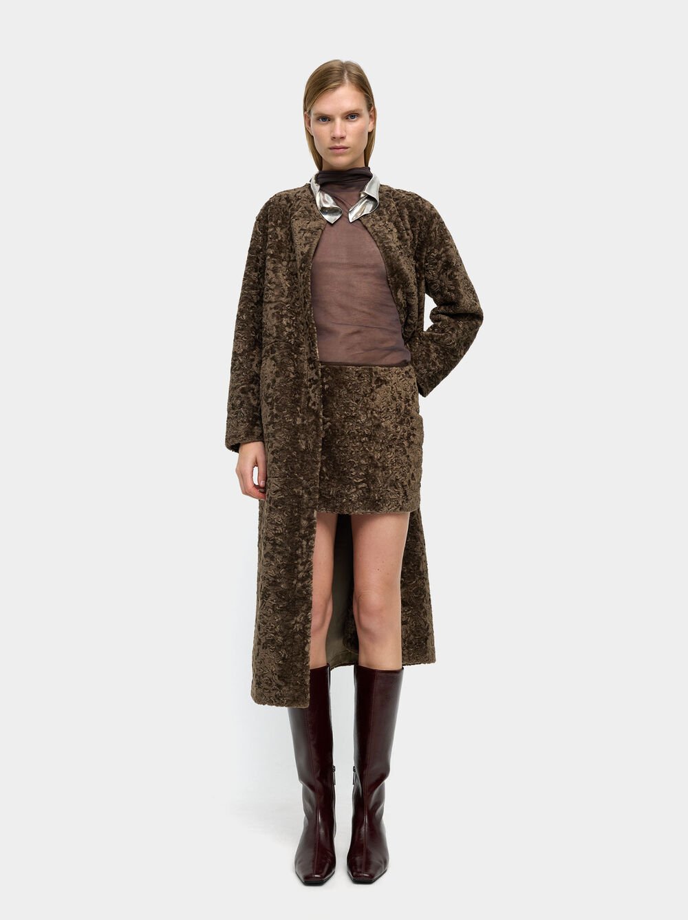 Botas de cano alto envernizadas