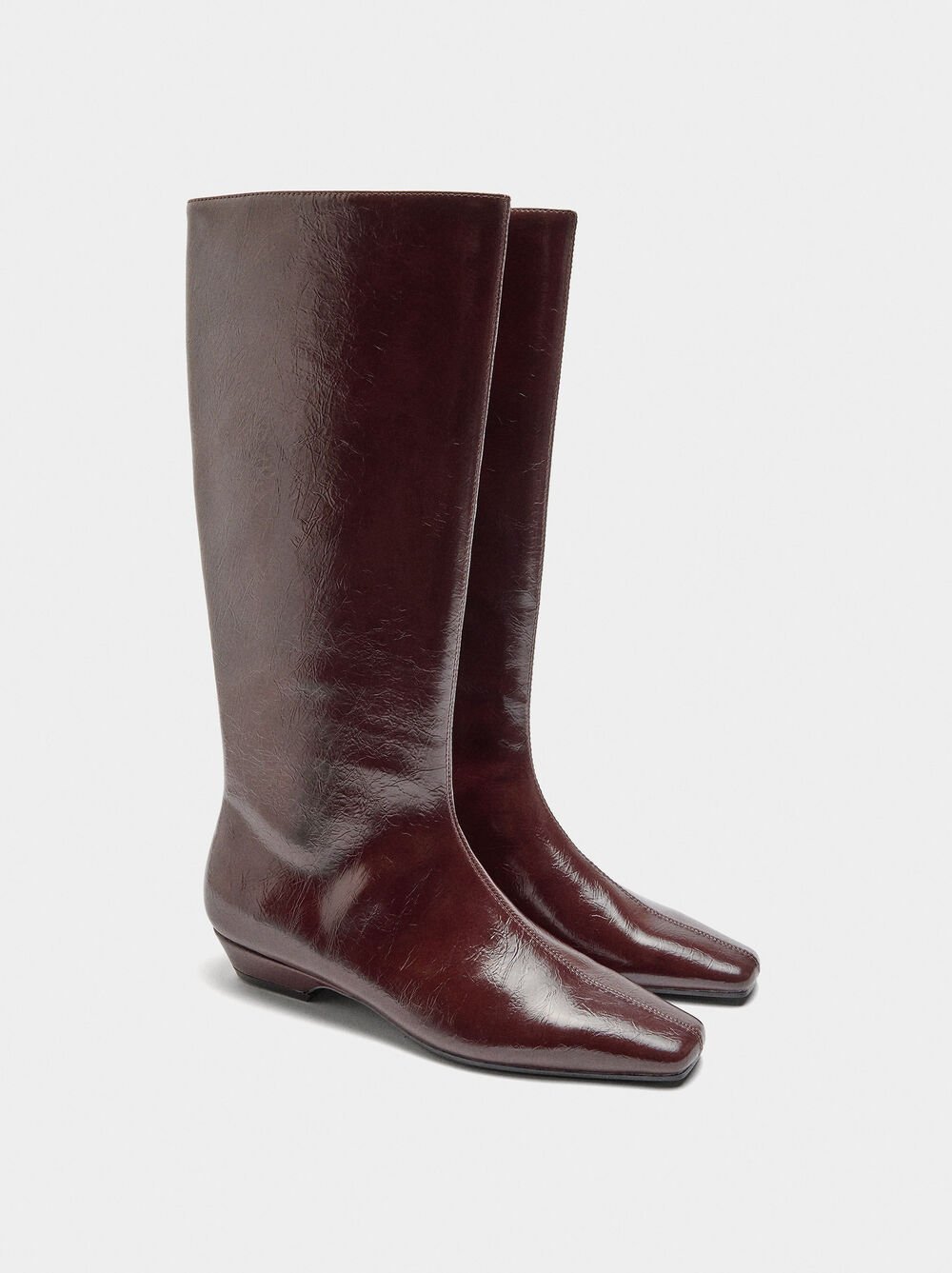 Botas de cano alto envernizadas