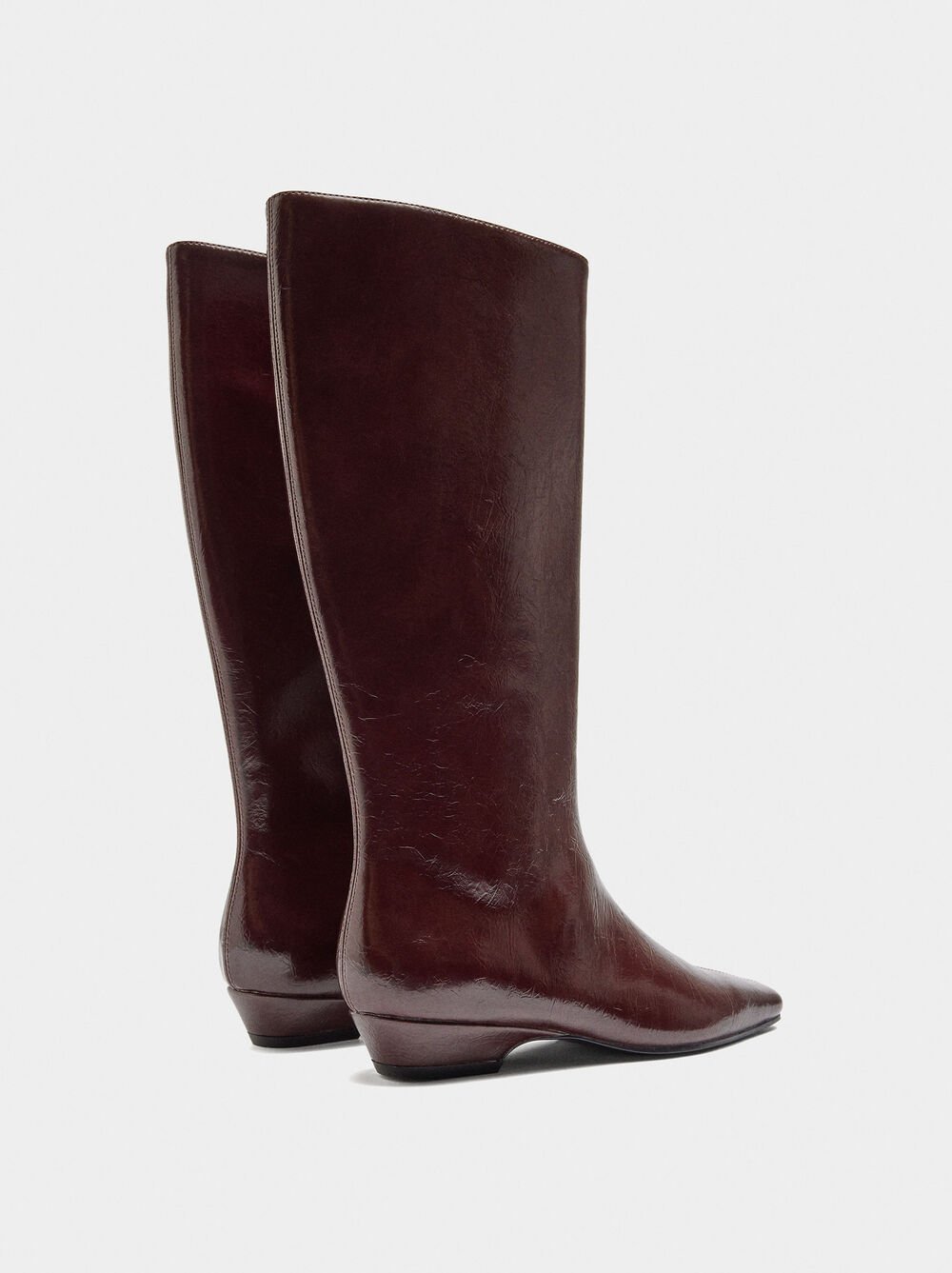 Botas de cano alto envernizadas