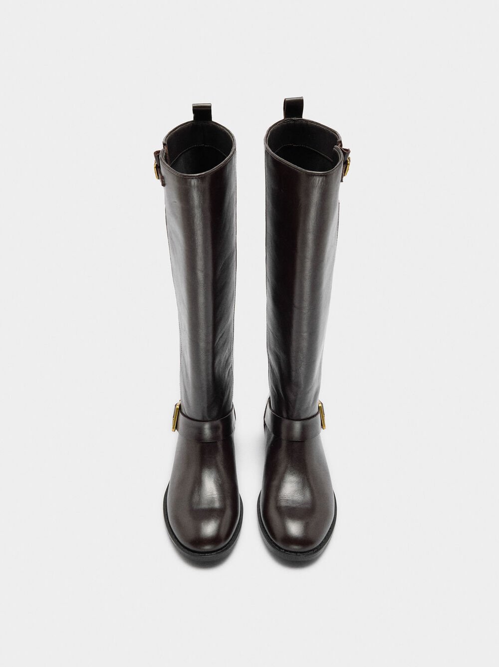 Botas de cano alto de pele com fivelas