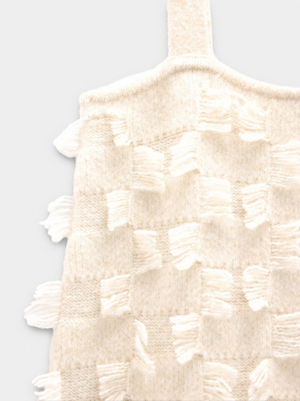 Vestido curto de malha com franjas