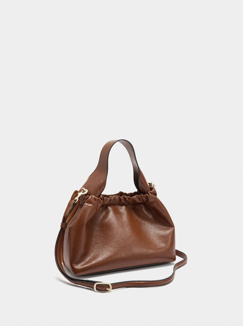 Mala tiracolo detalhes de pele