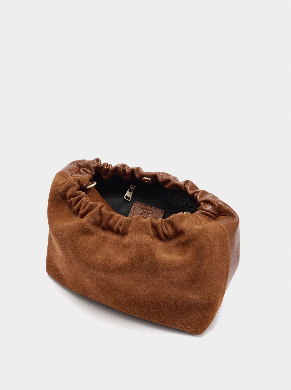 Mala tiracolo detalhes de pele