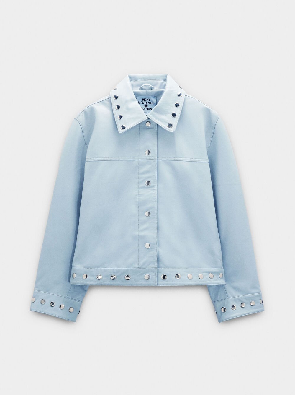 Casaco de pele com tachas