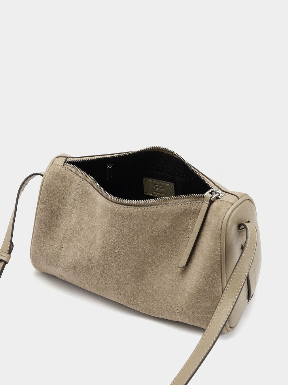 Mala tiracolo com detalhes de pele