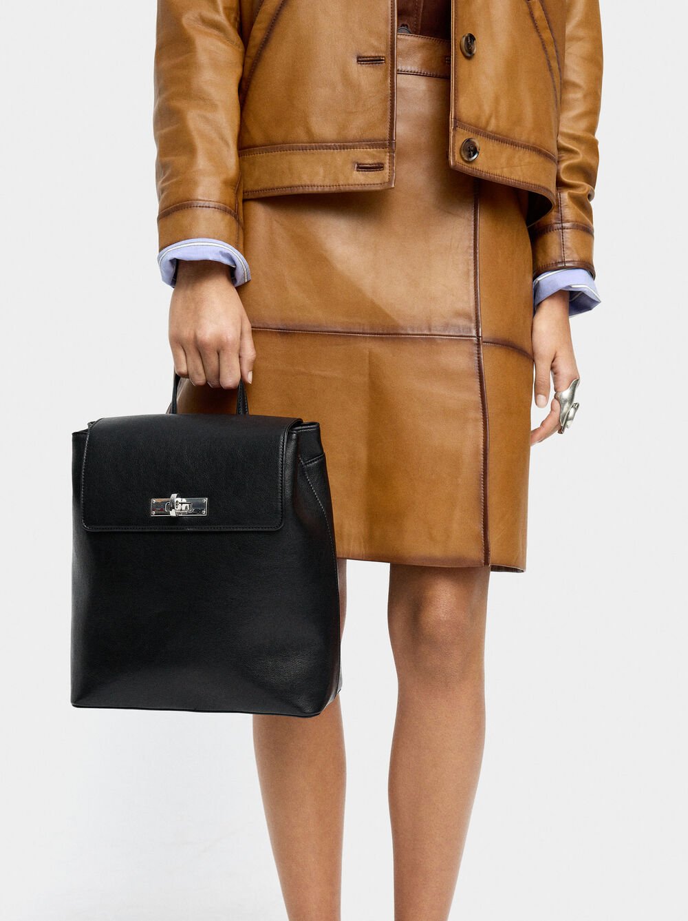 Mochila com fecho giratório