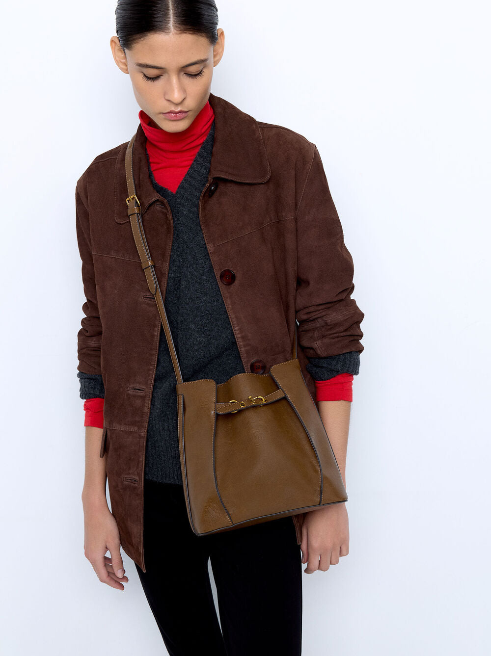 Mala bucket com dobras laterais