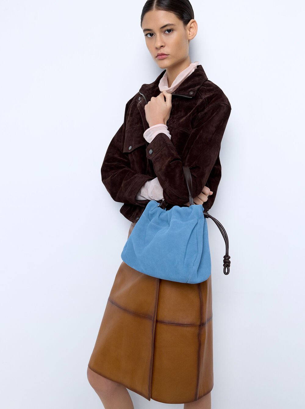 Mala de mão com pele camurça