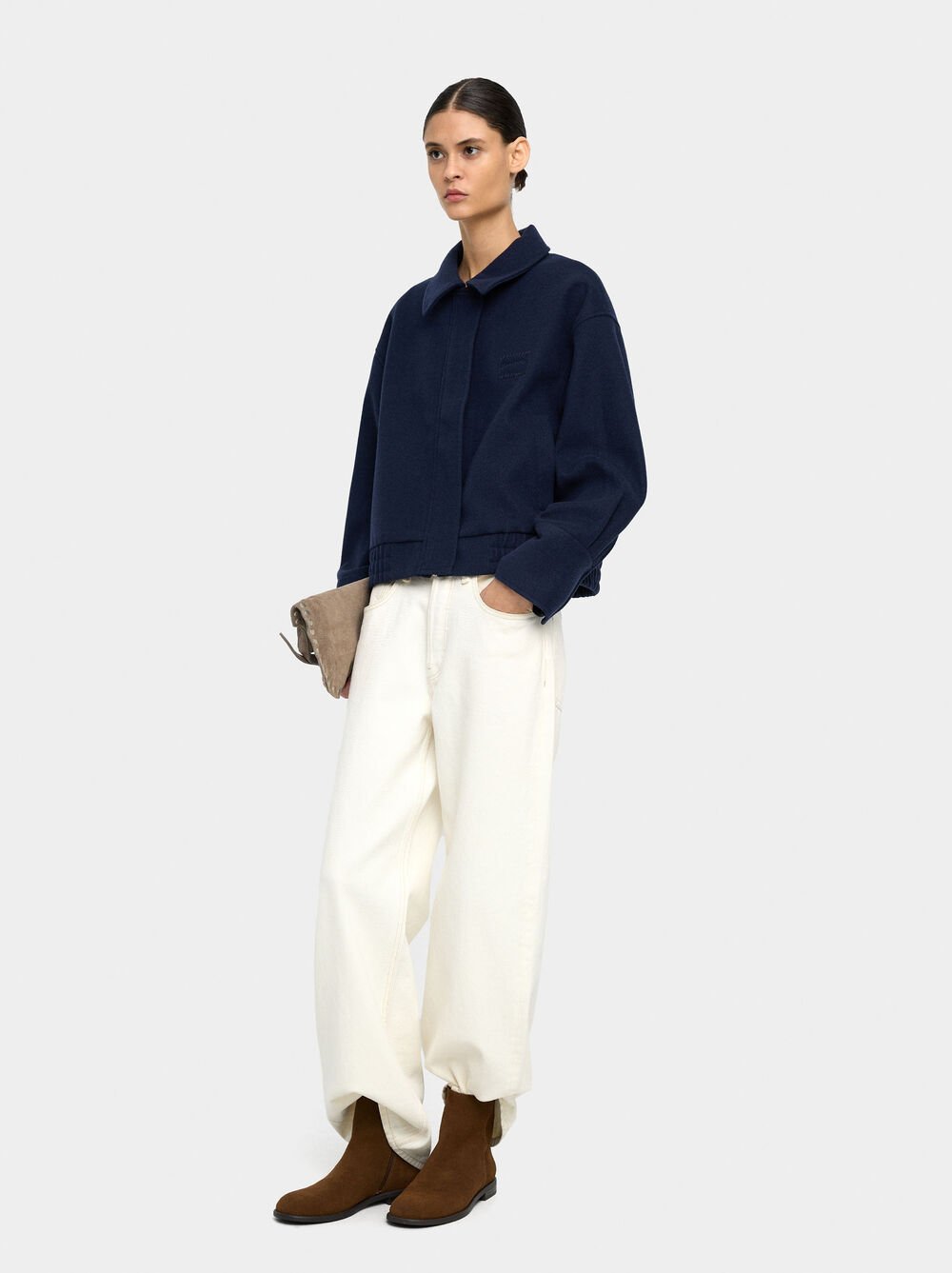 Casaco com bolsos e elástico