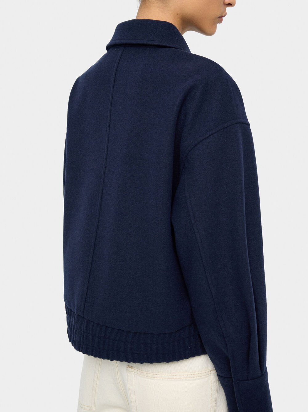 Casaco com bolsos e elástico